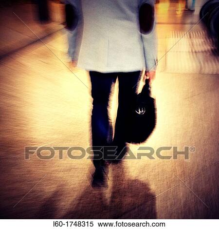 Man walking in RENFE station, Madrid, Spain View Large Photo Image Stock Photography - Man walking in RENFE station, Madrid, Spain. Fotosearch