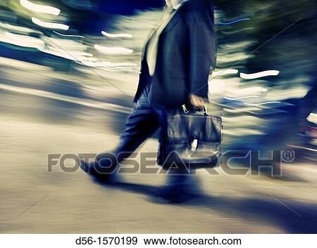 man walking with briefcase View Large Photo Image Stock Photo - man walking with briefcase. Fotosearch