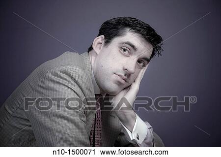 Man wearing a tie View Large Photo Image Stock Image - Man wearing a tie. Fotosearch