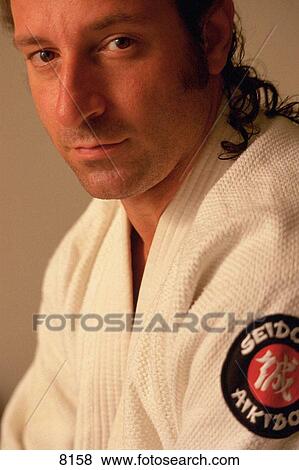 Stock Photo - Man wearing Aikido gi. Fotosearch
