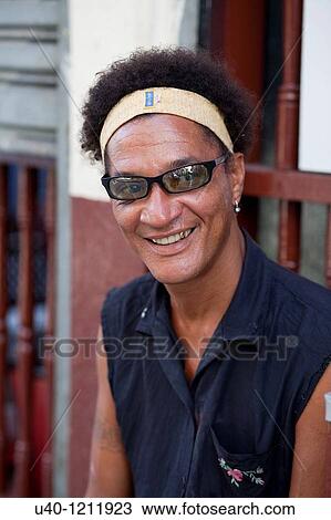 Stock Image - Man wearing head band. Fotosearch