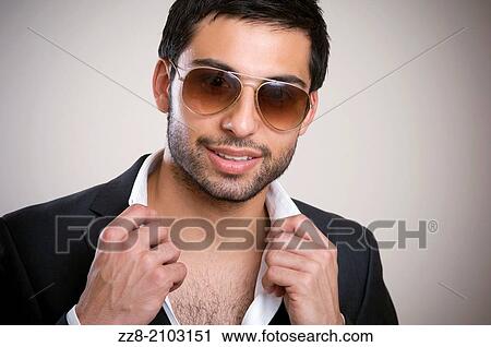 Man wearing sunglasses. View Large Photo Image Stock Image - Man wearing sunglasses.. Fotosearch