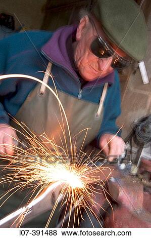 Man welding. Lurcy-Levis. France View Large Photo Image Stock Photo - Man welding. Lurcy-Levis. France. Fotosearch