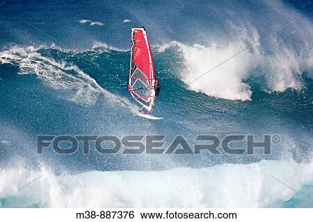 Man windsurfing on Maui, HI View Large Photo Image Stock Photograph - Man windsurfing on Maui, HI. Fotosearch