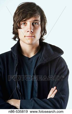 Man with arms crossed, American youth View Large Photo Image Stock Photo - Man with arms crossed, American youth. Fotosearch