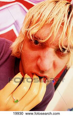 Man with artificial hand in mouth View Large Photo Image Stock Image - Man with artificial hand in mouth. Fotosearch