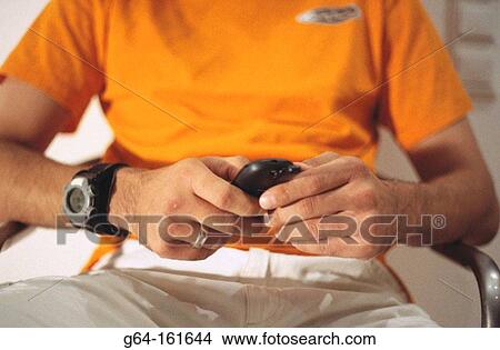 Man with cell phone View Large Photo Image Picture - Man with cell phone. Fotosearch