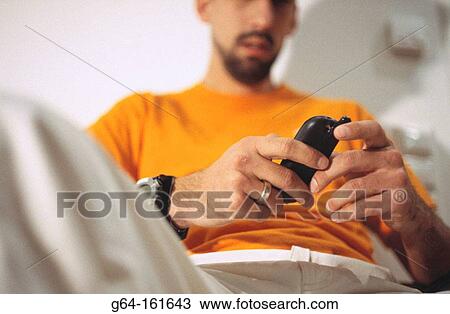 Man with cell phone View Large Photo Image Stock Image - Man with cell phone. Fotosearch