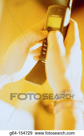 Man with cell phone View Large Photo Image Stock Photo - Man with cell phone. Fotosearch