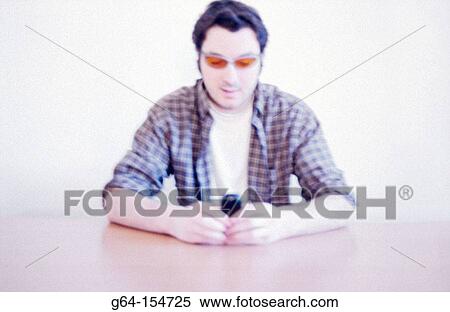 Stock Photography - Man with cell phone. Fotosearch