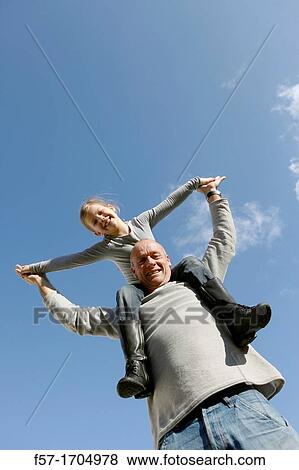 Stock Photo - Man with daughter. Fotosearch