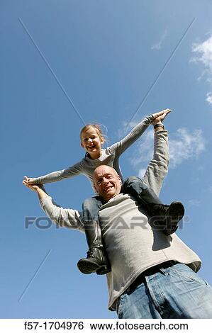 Man with daughter View Large Photo Image Stock Photograph - Man with daughter. Fotosearch