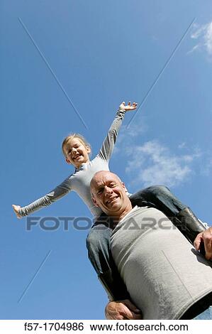 Stock Photograph - Man with daughter. Fotosearch