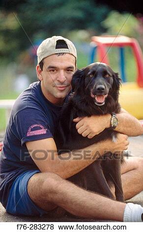 Man with dog View Large Photo Image Stock Photo - Man with dog. Fotosearch