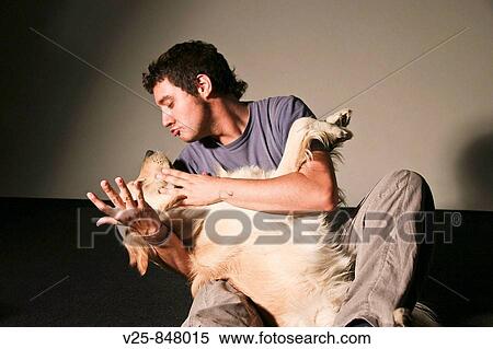 Stock Photography - Man with dog. Fotosearch