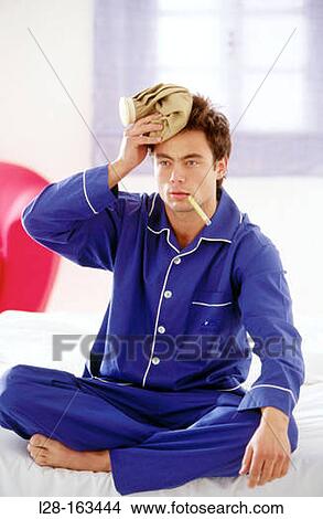 Picture - Man with headache. Fotosearch