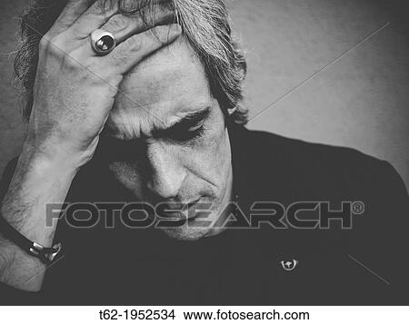 Man with headache. View Large Photo Image Picture - Man with headache.. Fotosearch