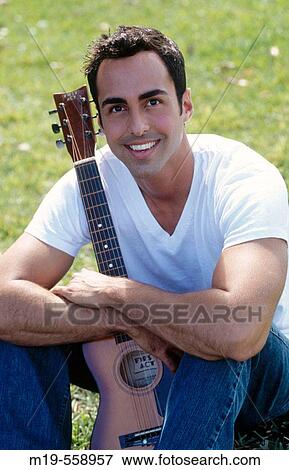 man with his guitar View Large Photo Image Stock Photo - man with his guitar. Fotosearch