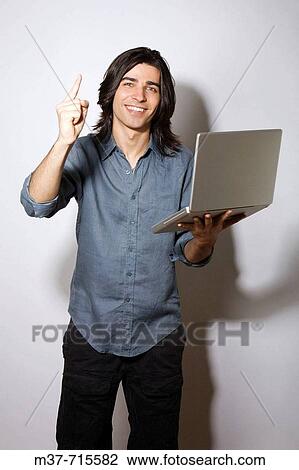 Man with laptop. View Large Photo Image Stock Image - Man with laptop.. Fotosearch