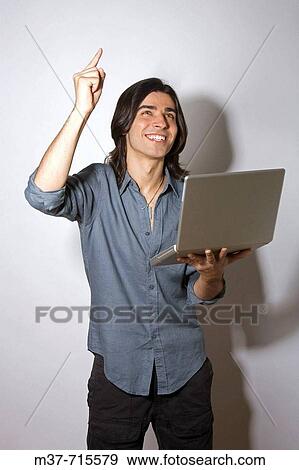 Man with laptop. View Large Photo Image Stock Photo - Man with laptop.. Fotosearch
