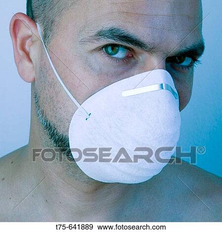 Stock Photo - Man with mask.. Fotosearch