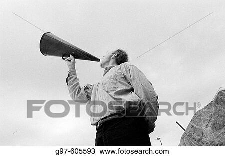 Man with megaphone View Large Photo Image Stock Image - Man with megaphone. Fotosearch