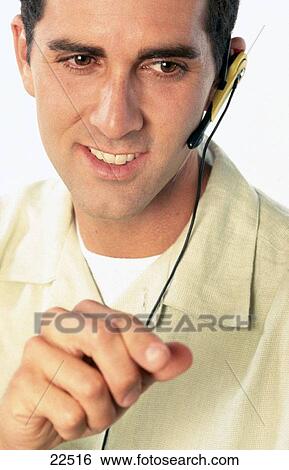Man with phone headset View Large Photo Image Stock Photograph - Man with phone headset. Fotosearch