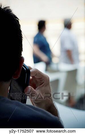 Man with phone View Large Photo Image Stock Photo - Man with phone. Fotosearch