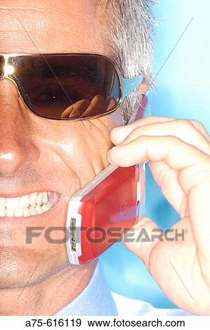Man with Red Phone View Large Photo Image Stock Photo - Man with Red Phone. Fotosearch