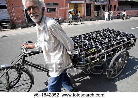 Man with rickshaw and sewing machines Jaipiur Rajasthan India View Large Photo Image Stock Image - Man with rickshaw and sewing machines Jaipiur Rajasthan India. Fotosearch