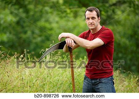 Man with scythe, hand tool, farming, Guipuzcoa, Basque Country, Spain View Large Photo Image Stock Photograph - Man with scythe, hand tool, farming, Guipuzcoa, Basque Country, Spain. Fotosearch