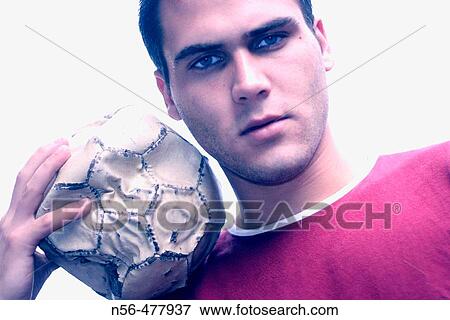 Stock Photo - Man with soccer ball. Fotosearch