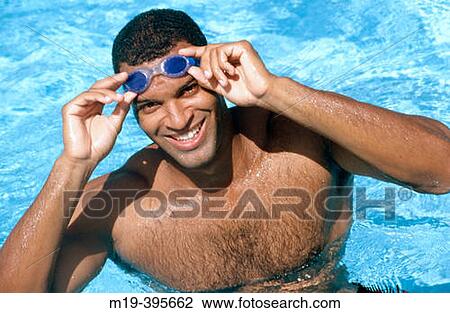 Stock Image - man with swiming goggles. Fotosearch