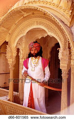 Stock Photography - Man with sword. Jaisalmer Desert Festival. Rajasthan. India. Fotosearch