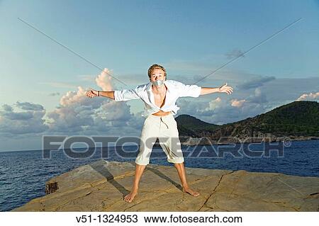 Man with tape over his mouth in a cliff in Ibiza View Large Photo Image Stock Image - Man with tape over his mouth in a cliff in Ibiza. Fotosearch