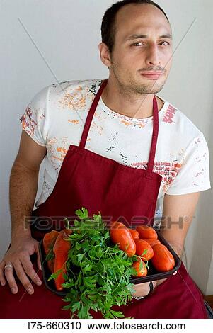 Man with vegetables View Large Photo Image Stock Image - Man with vegetables. Fotosearch