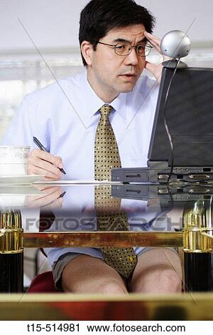 Man working from home (dinning room) half dressed, tele conferencing thru web cam View Large Photo Image Stock Image - Man working from home (dinning room) half dressed, tele conferencing thru web cam. Fotosearch