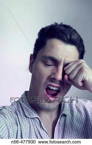 Man yawning View Large Photo Image Stock Image - Man yawning. Fotosearch