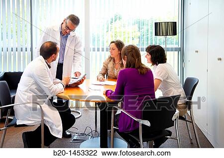 Stock Image - Management and business administration meeting, offices, Vicomtech-IK4 Visual Interaction and Communication Technologies Centre, applied research centre for Interactive Computer Graphics and Multimedia. Fotosearch
