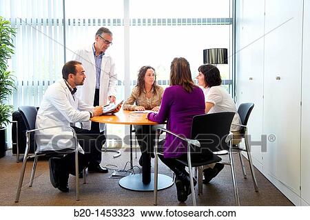 Stock Image - Management and business administration meeting, offices, Vicomtech-IK4 Visual Interaction and Communication Technologies Centre, applied research centre for Interactive Computer Graphics and Multimedia. Fotosearch