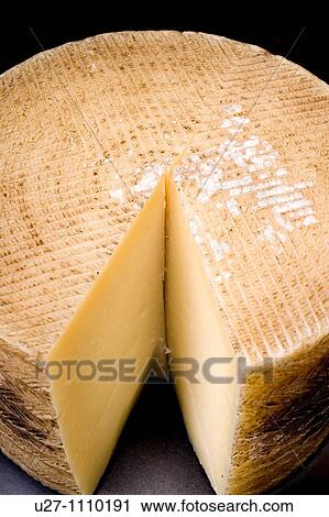 Stock Image - Manchego cheese. Fotosearch