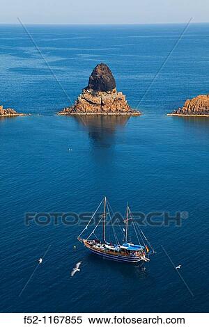 Mancolibre, Mascarat and Senyoreta stacks, Illa Grossa, Columbretes Islands, Castellon province, Comunidad Valenciana, Spain View Large Photo Image Stock Photography - Mancolibre, Mascarat and Senyoreta stacks, Illa Grossa, Columbretes Islands, Castellon province, Comunidad Valenciana, Spain. Fotosearch