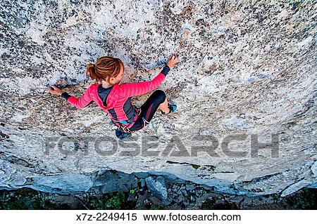 Mandi Eldridge rock climbing a route called Cruel Shoes which is rated 5, 7 and located on Stripe Rock at the City Of Rocks National Reserve near the town of Almo in southern Idaho. View Large Photo Image Stock Photography - Mandi Eldridge rock climbing a route called Cruel Shoes which is rated 5, 7 and located on Stripe Rock at the City Of Rocks National Reserve near the town of Almo in southern Idaho.. Fotosearch