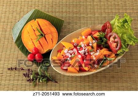 Stock Image - Mango, tomato and basilic salad,.. Fotosearch