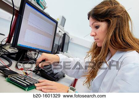 Stock Photo - Manipulating acquisition card, Biomedical Instrumentation Laboratory, Biomedical Engineering, CEIT (Center of Studies and Technical Research), University of Navarra, Donostia, Gipuzkoa, Basque Country, Spain. Fotosearch