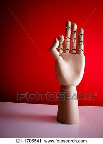 Mannequin wooden hand saying ok. Red background. View Large Photo Image Stock Image - Mannequin wooden hand saying ok. Red background.. Fotosearch