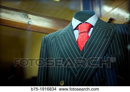 mannequine store window with dressed in men's classic style suit in a store of London, England, UK View Large Photo Image Picture - mannequine store window with dressed in men's classic style suit in a store of London, England, UK. Fotosearch