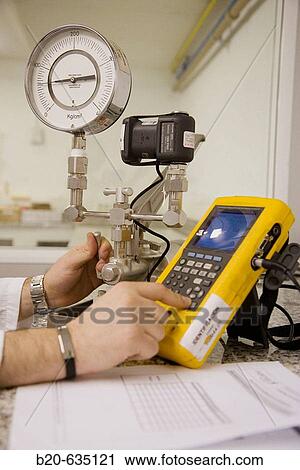 Stock Image - Manometer calibration. Calibration Laboratory. Technology and Research Centre. Inasmet-Tecnalia Foundation, San Sebastian, Gipuzkoa, Euskadi. Spain.. Fotosearch