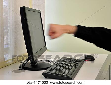 Man`s clenched fist about to hit computer monitor blurred motion View Large Photo Image Stock Image - Man`s clenched fist about to hit computer monitor blurred motion. Fotosearch