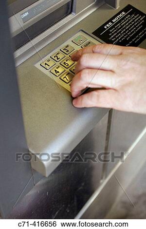 Man's hand on atm machine View Large Photo Image Stock Photograph - Man's hand on atm machine. Fotosearch